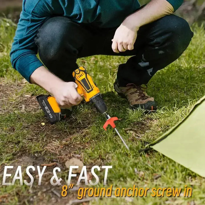 Person using drill to screw in 8" metal ground anchor for tent camping setup.