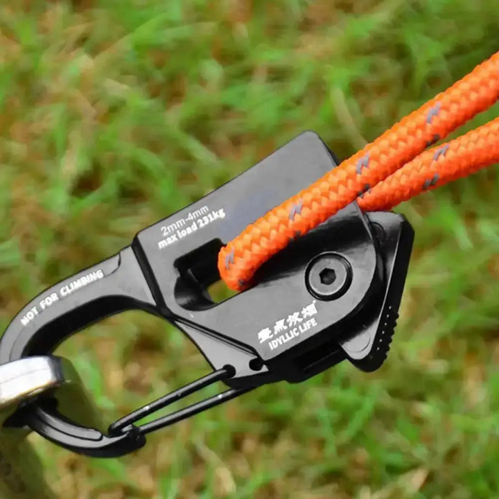 "Mini aluminum rope tensioner with orange camping cord, quick release system for tents and canopies, lightweight and rustproof"